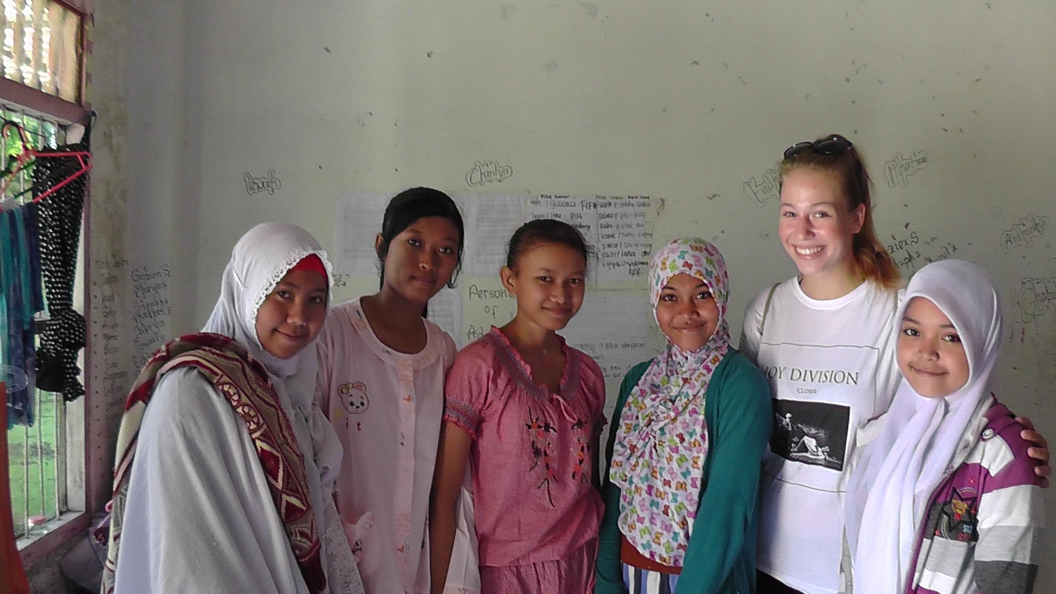 Volunteer with girls from the orphange