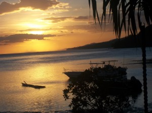 sunset at mango bay with our raft in the background